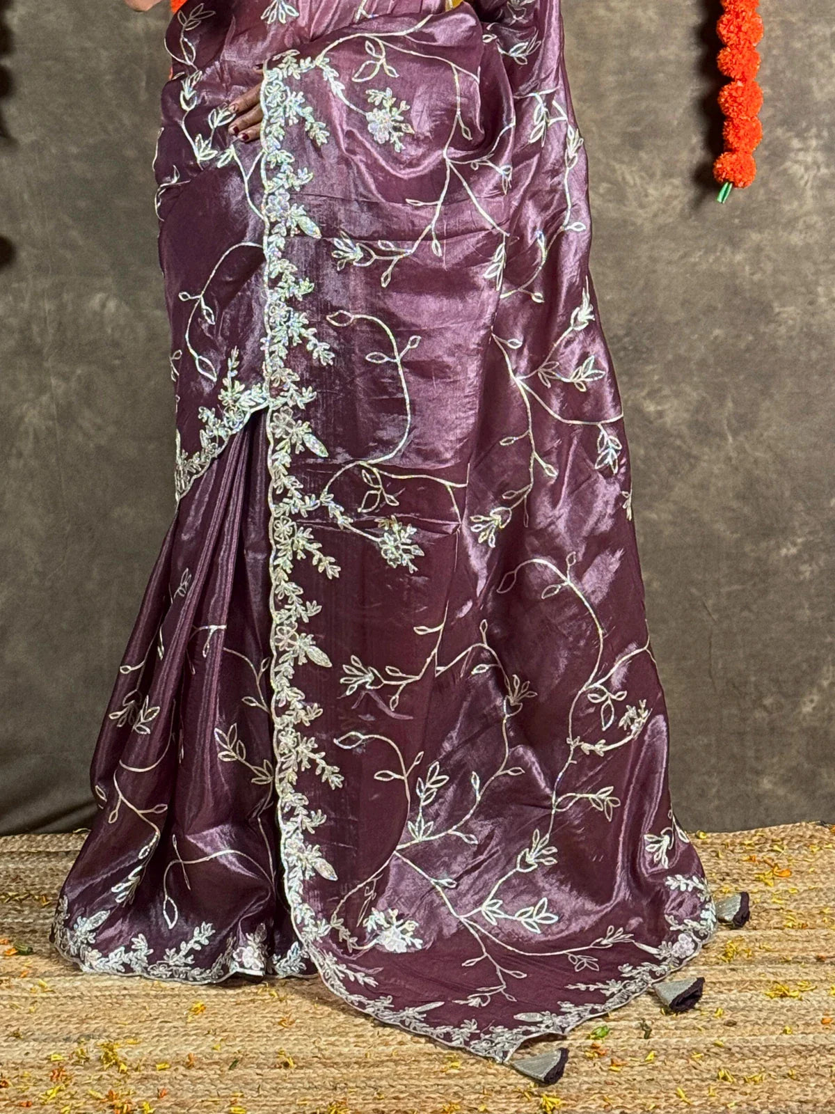 Tarani purple crystal silk saree pallu view highlighting intricate border and floral work