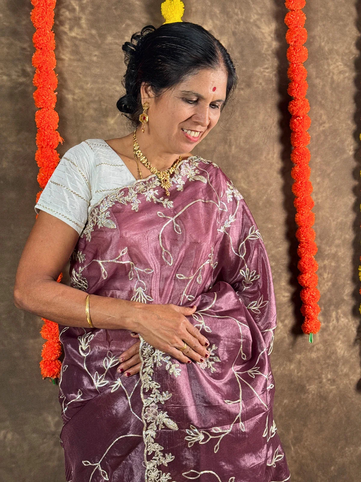 Tarani crystal silk purple saree upper body view showing elegant drape and embroidery