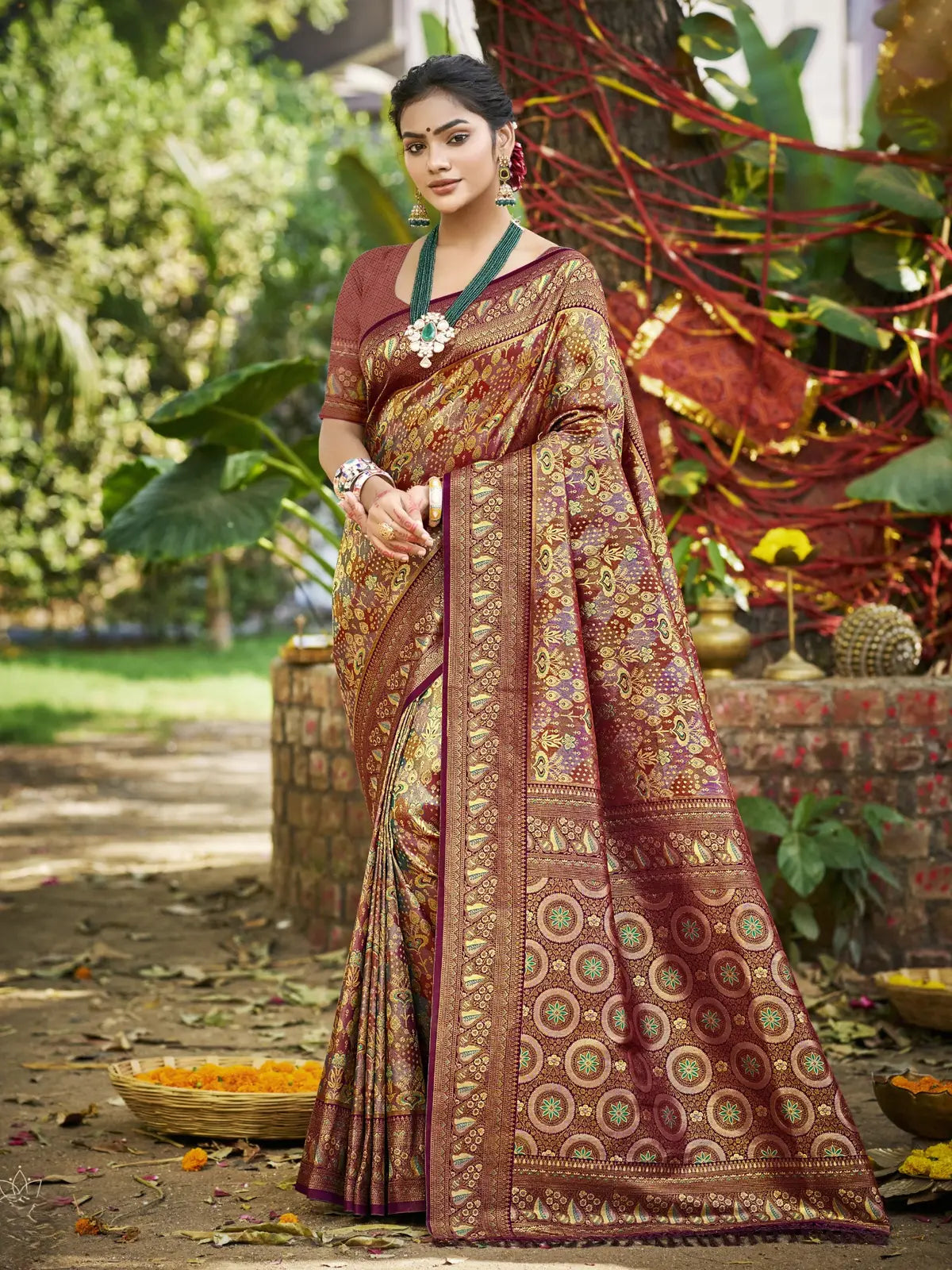 Tarani maroon Dharmavaram festive saree with golden zari border and traditional blouse