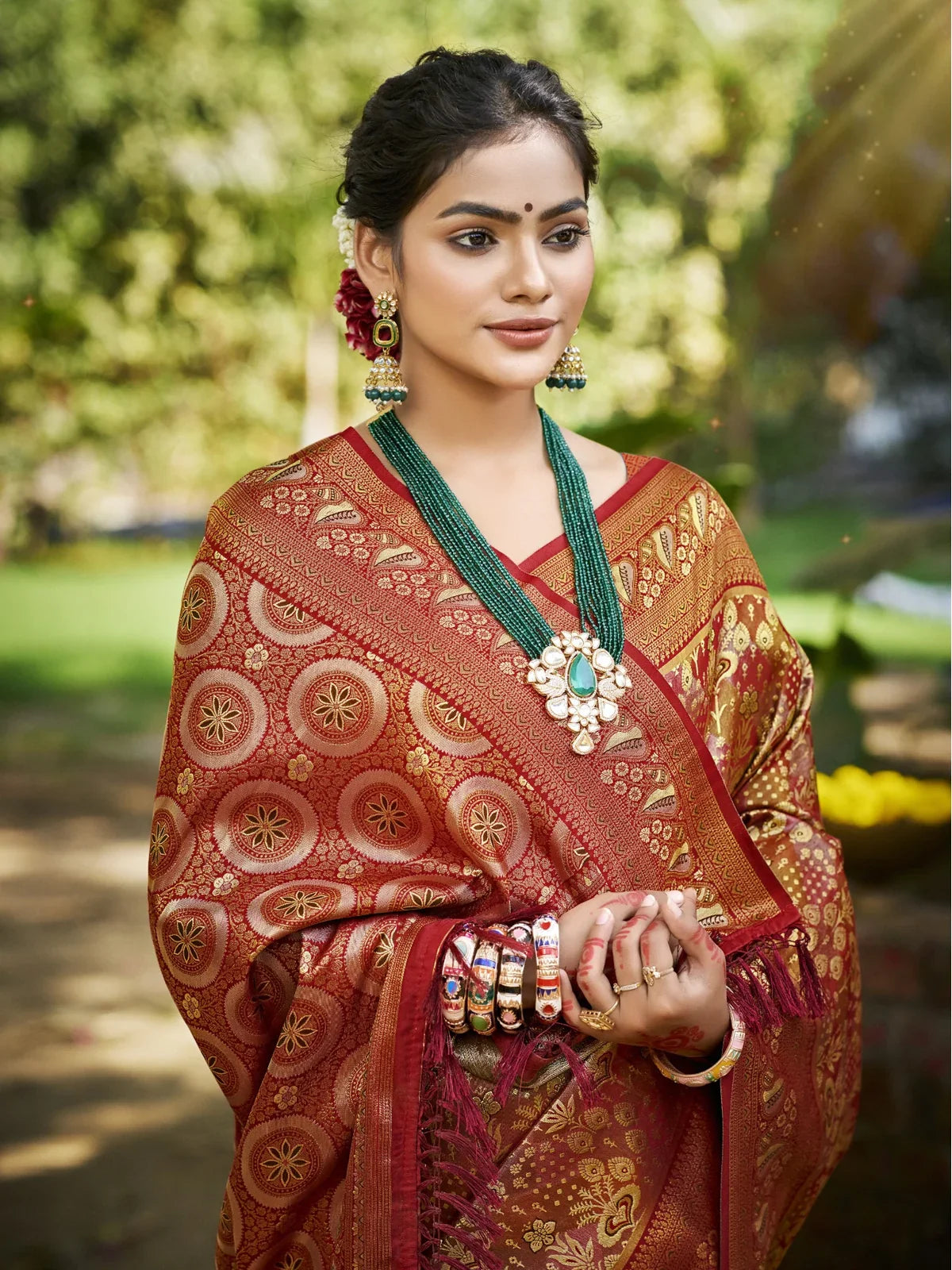 Tarani maroon Dharmavaram saree upper body closeup with jewellery