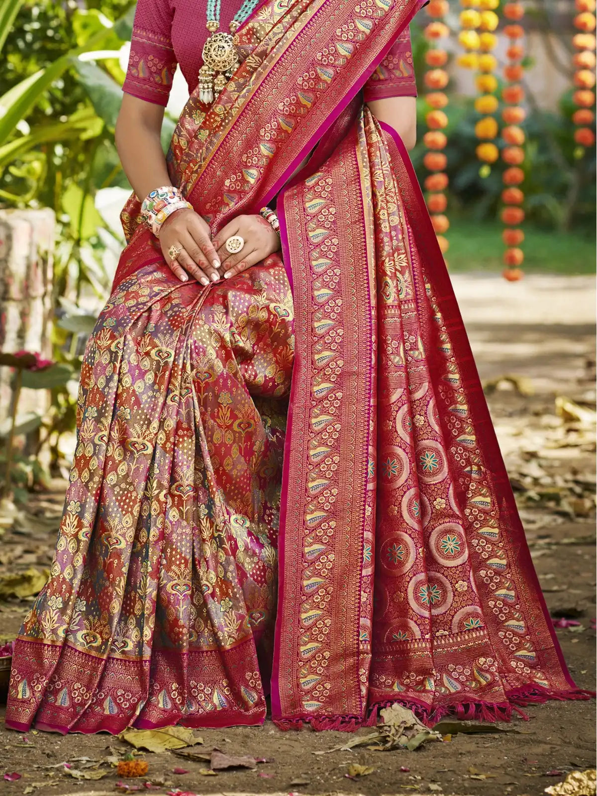 Tarani Dharmavaram pink saree pallu view highlighting rich design and woven details