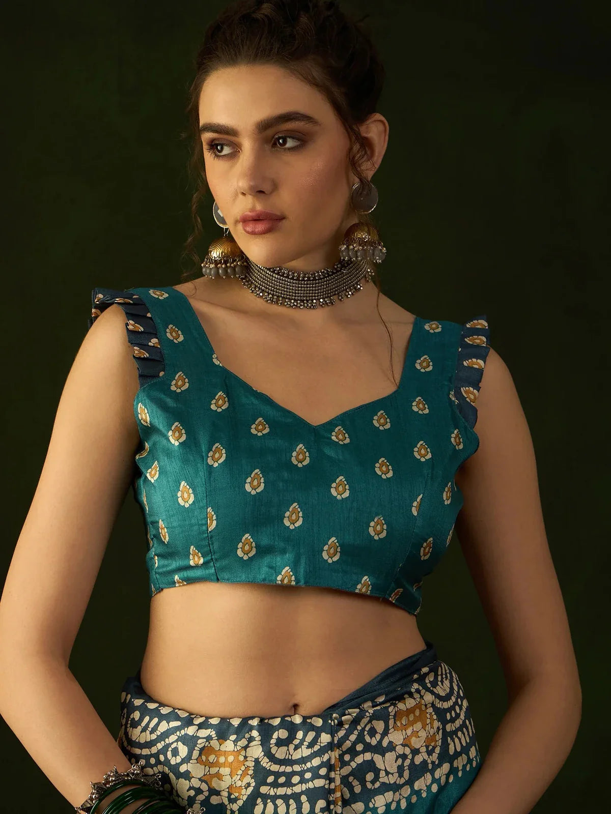 Tarani Dola silk blouse closeup with traditional motif design
