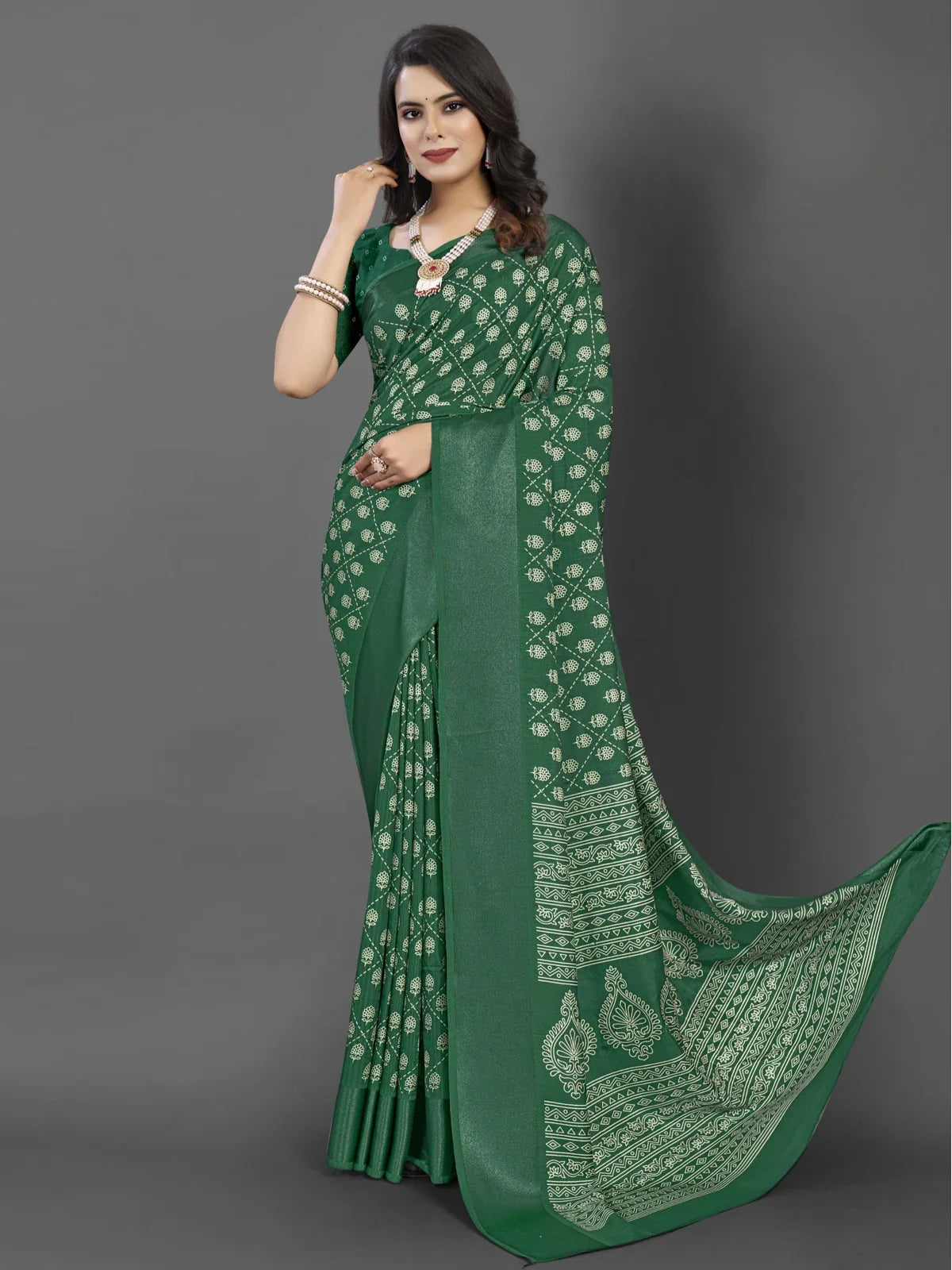 Tarani green Dola silk saree full view showing elegant woven design and perfect festive drape