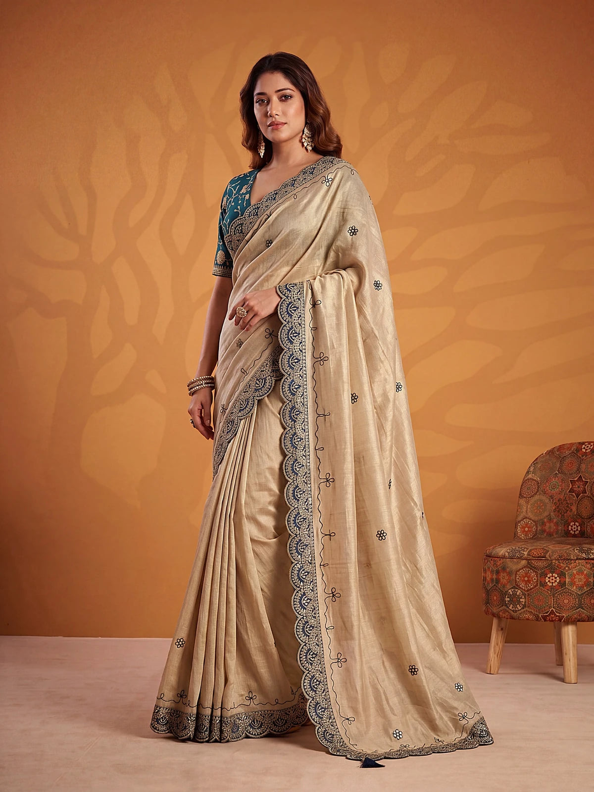 Tarani Devrati beige Erodee Silk saree elegant side pose with embroidered border