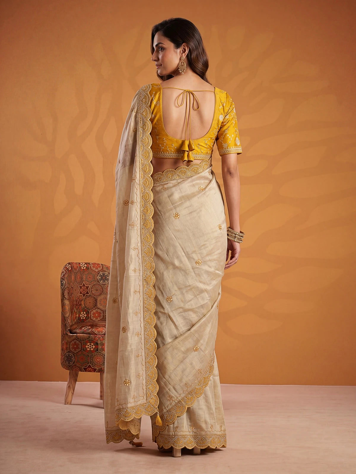 Tarani mustard Erodee silk saree back view showcasing blouse pattern and detailed border work