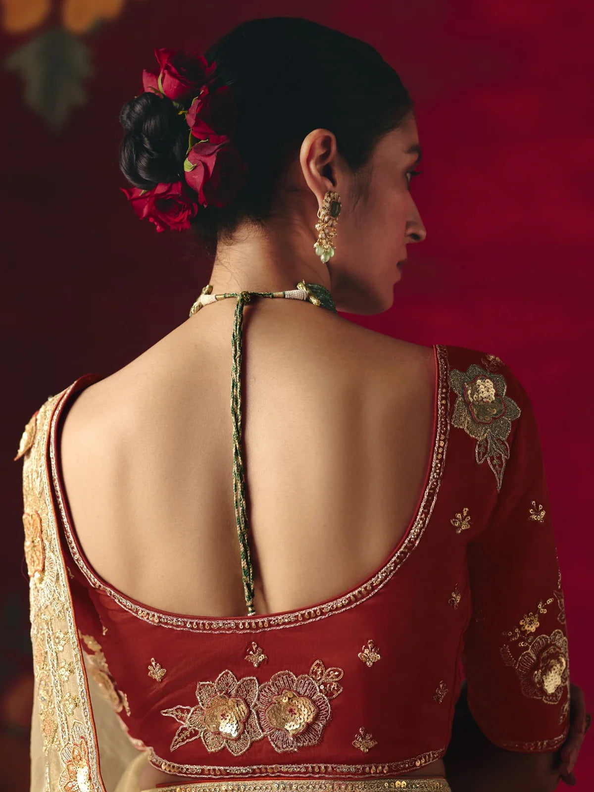 Tarani maroon fancy blouse back design with golden embroidery