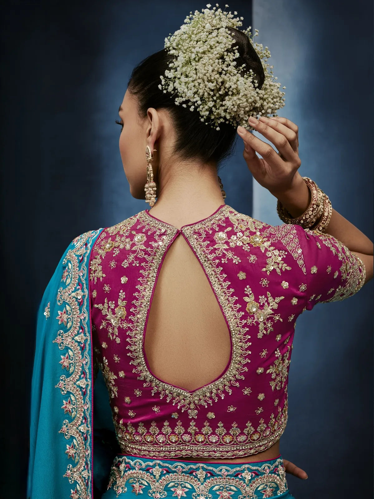 Tarani blue fancy saree back blouse view with intricate embroidery and elegant styling