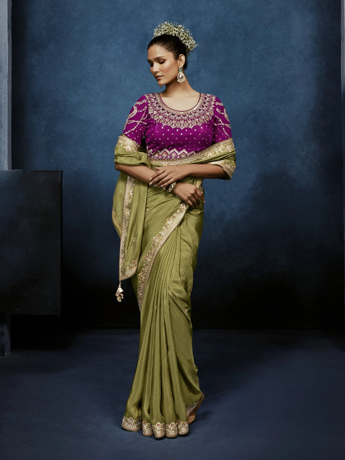 Tarani green fancy saree front view with heavy blouse embroidery for festive celebrations