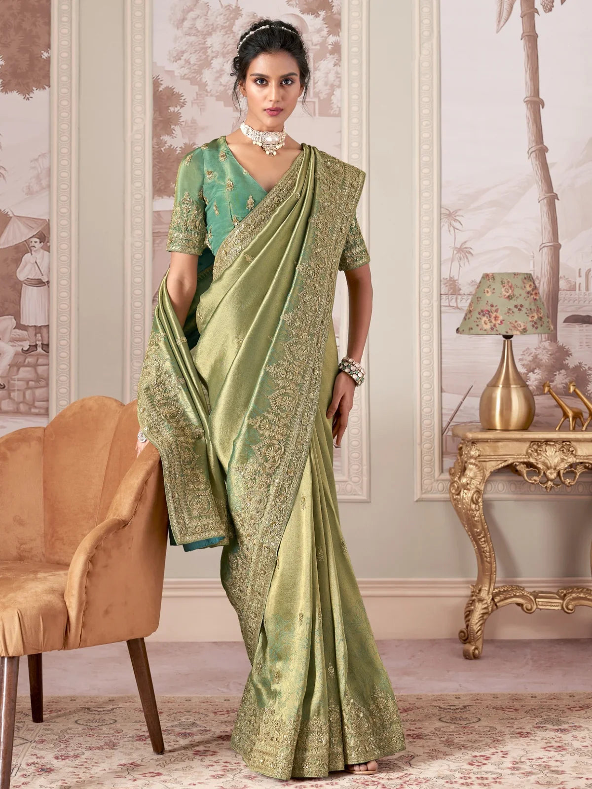 Tarani premium green fancy saree full view with heavy cutwork border and embroidered blouse