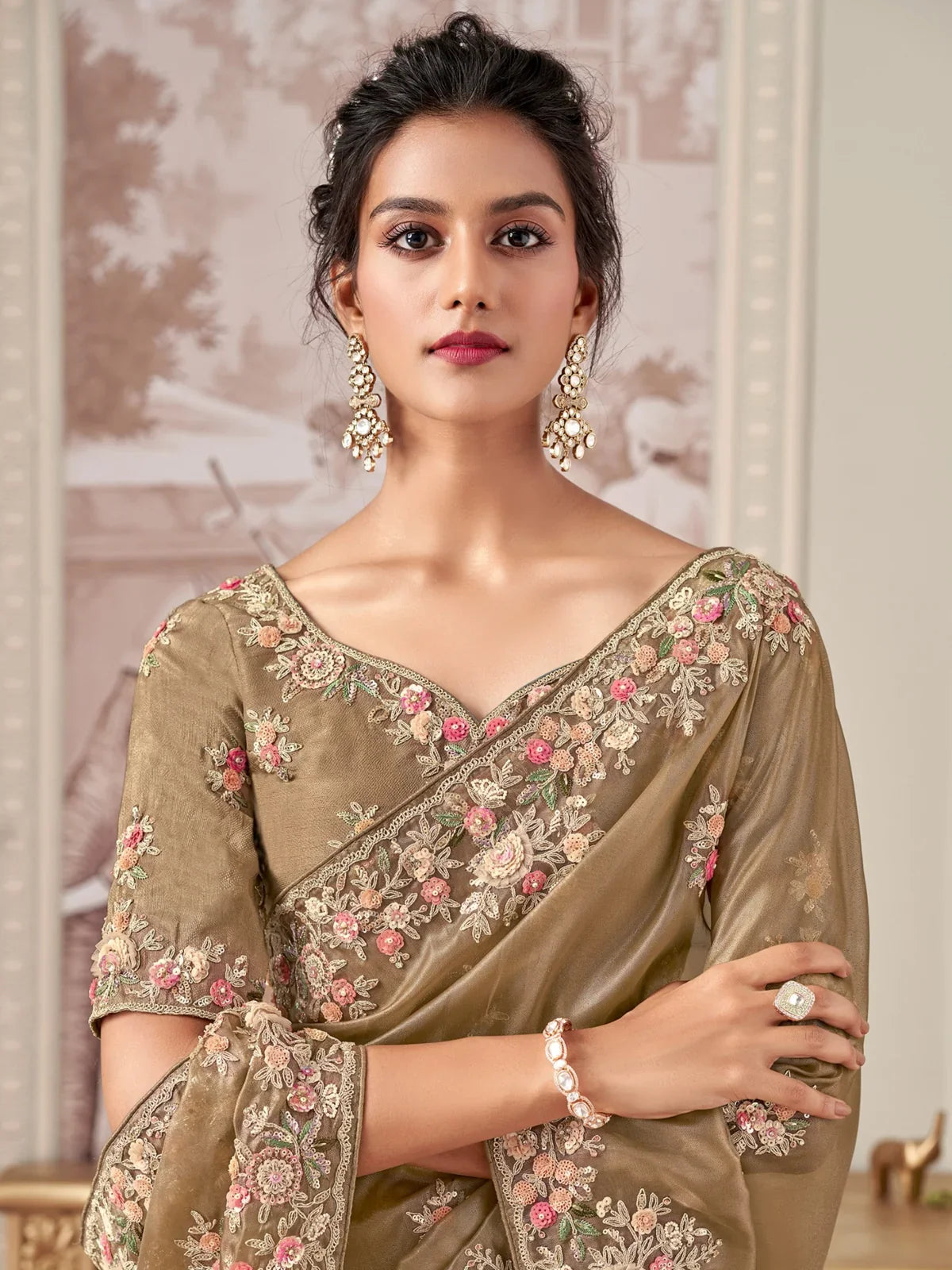 Tarani green fancy saree upper body view showing embroidered blouse design