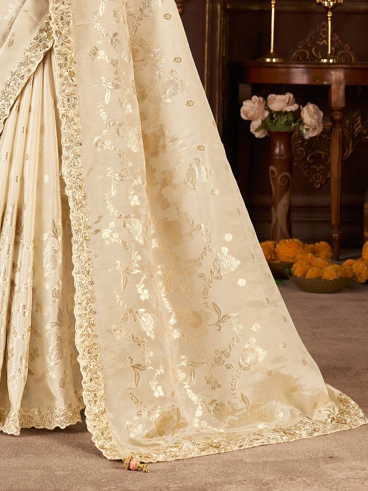 Tarani fancy saree off white pallu with rich golden zari border and heavy latkan detailing