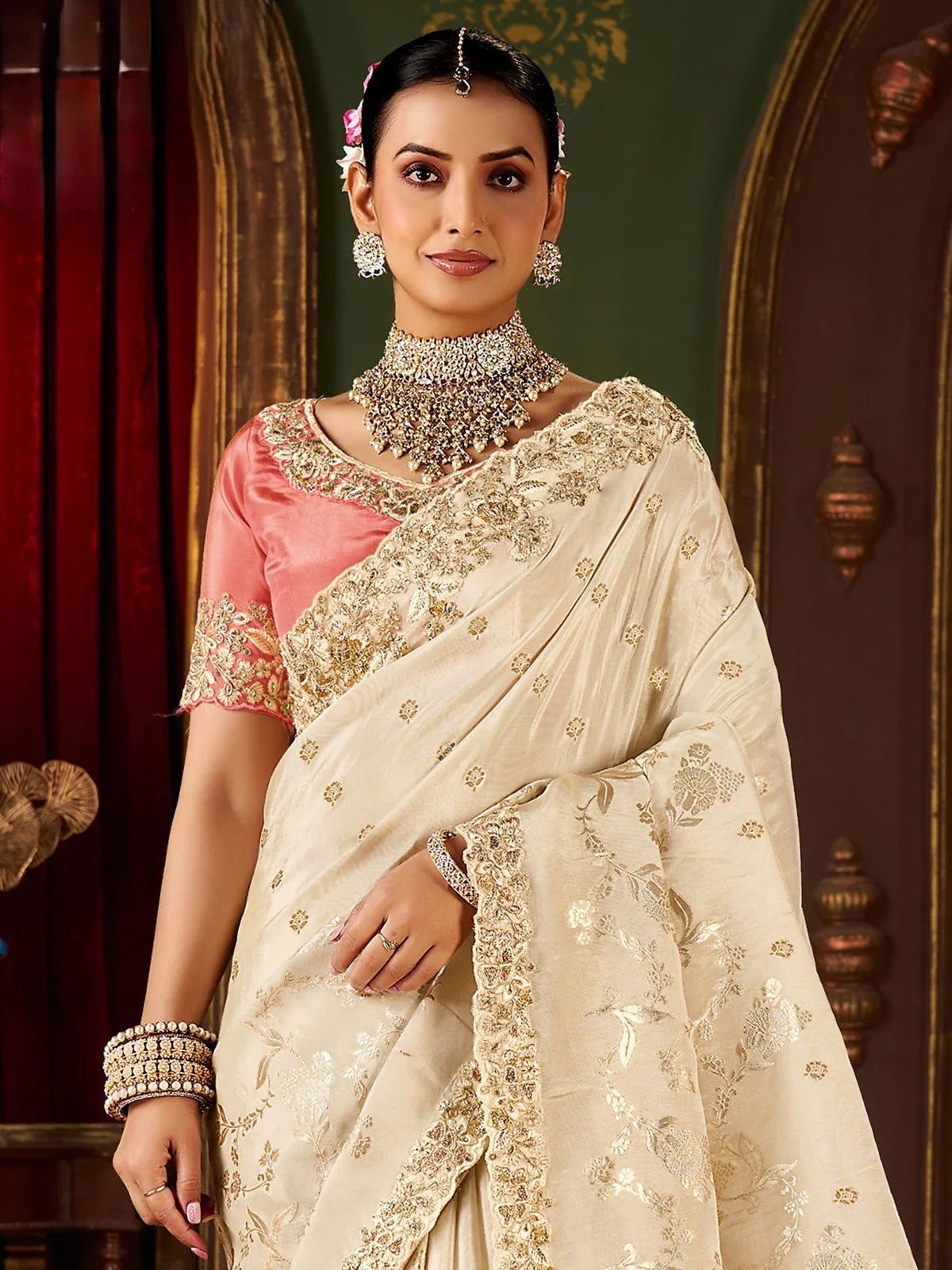 Tarani designer off white saree with pink embroidered blouse close up view for party wear
