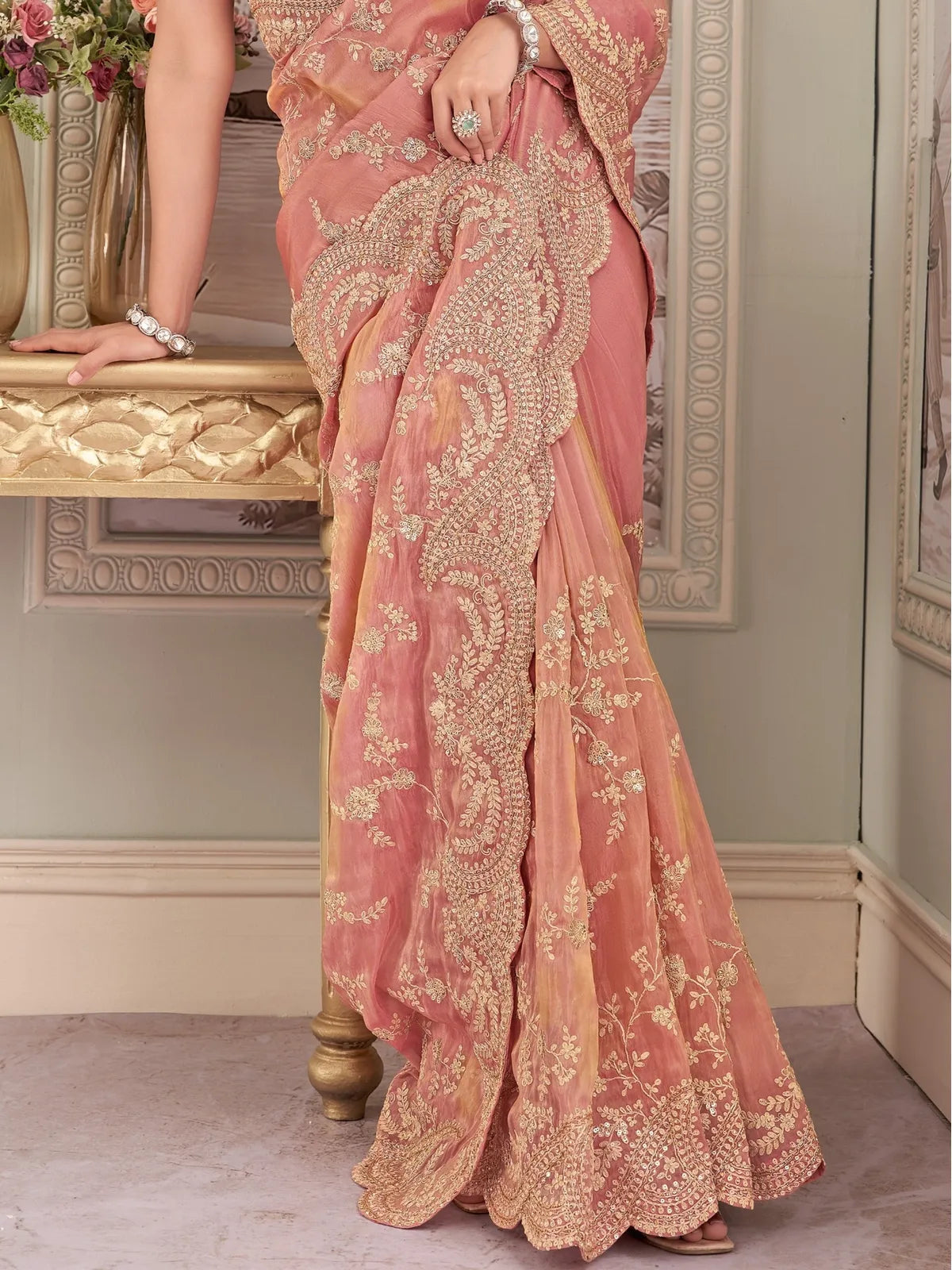 Tarani peach fancy saree fabric hand work embroidery closeup view Gitikavati