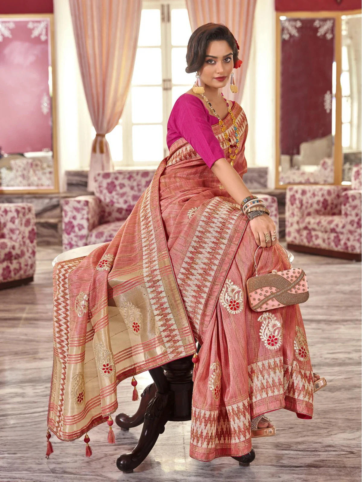 Tarani peach-pink fancy saree full view with festive embroidery and tassel border