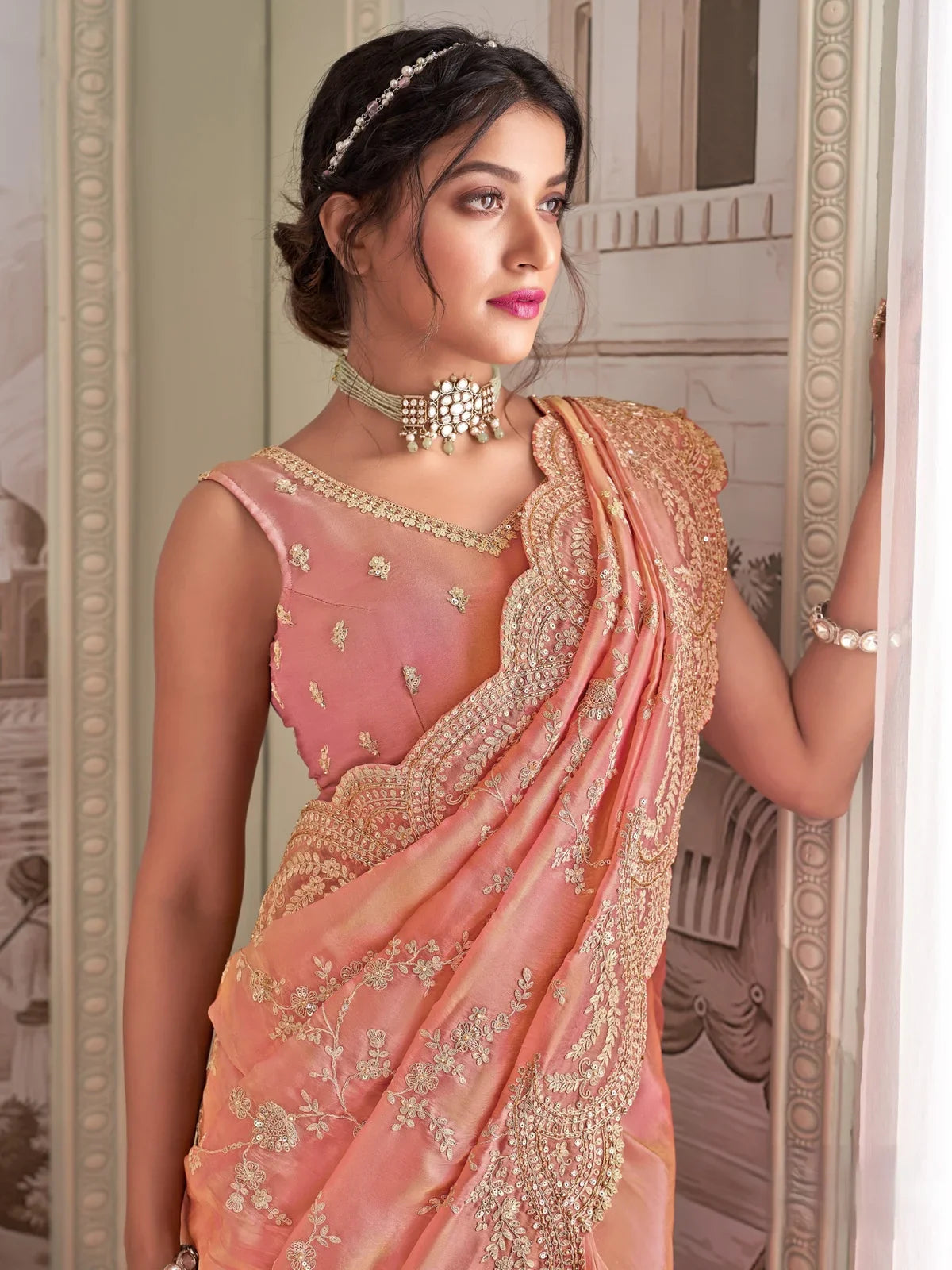 Tarani peach fancy saree with blouse embroidery upper body view Gitikavati