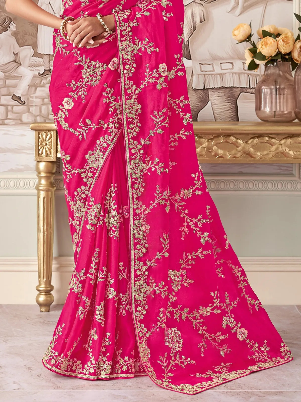 Tarani pink fancy saree close front view with floral golden embroidery
