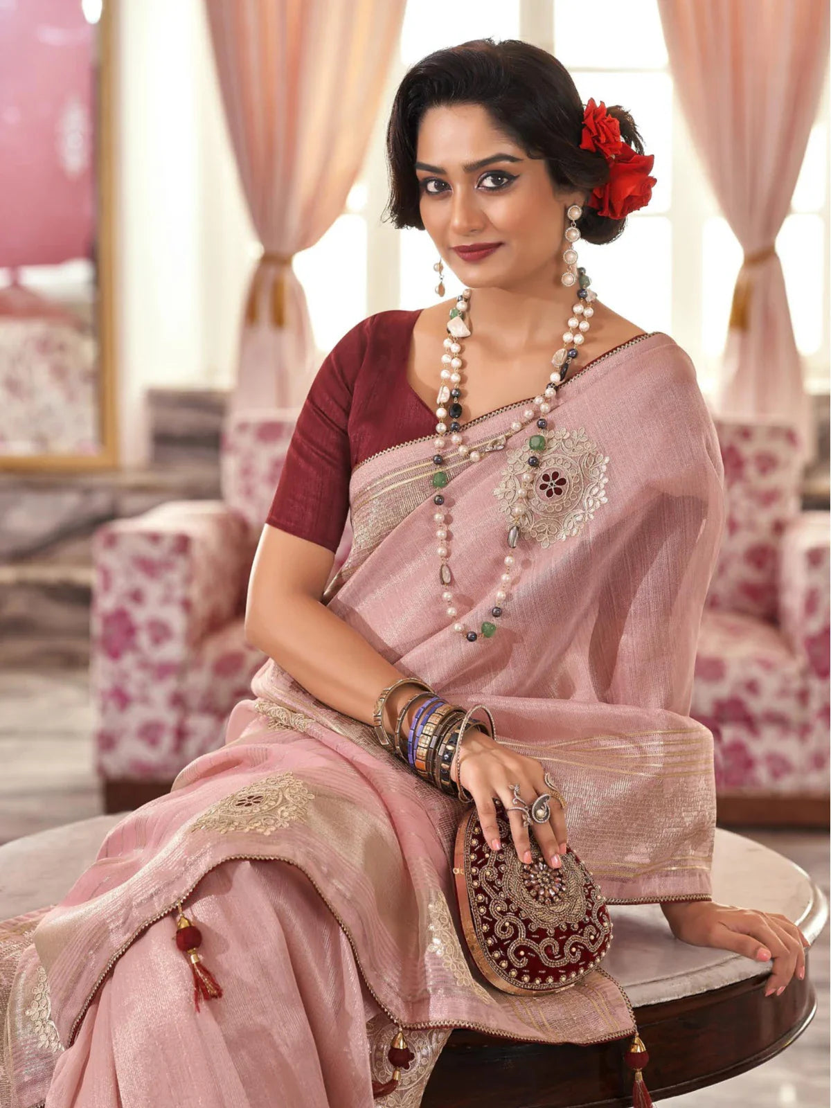 Tarani premium pink fancy saree upper-body view showing intricate golden zari work