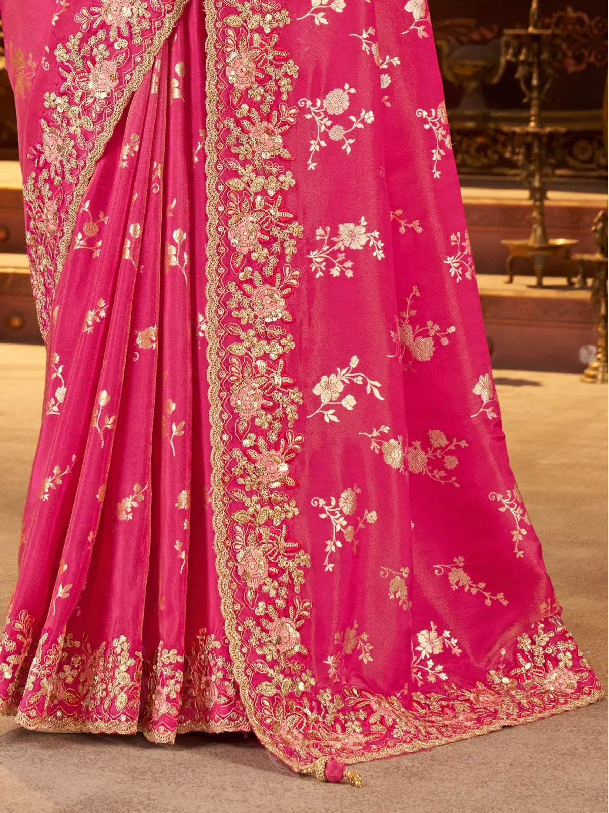 Tarani premium pink saree with heavy zari floral border and latkan pallu - close-up pallu view