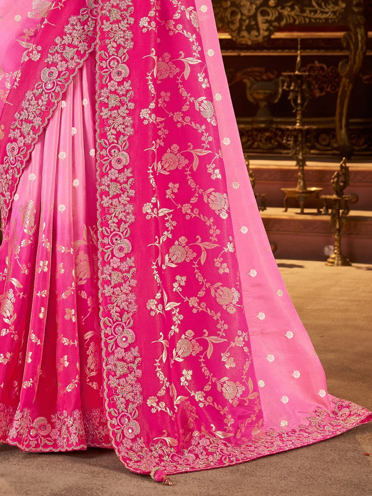 Tarani close view of zari pallu and border embroidery in pink fancy saree