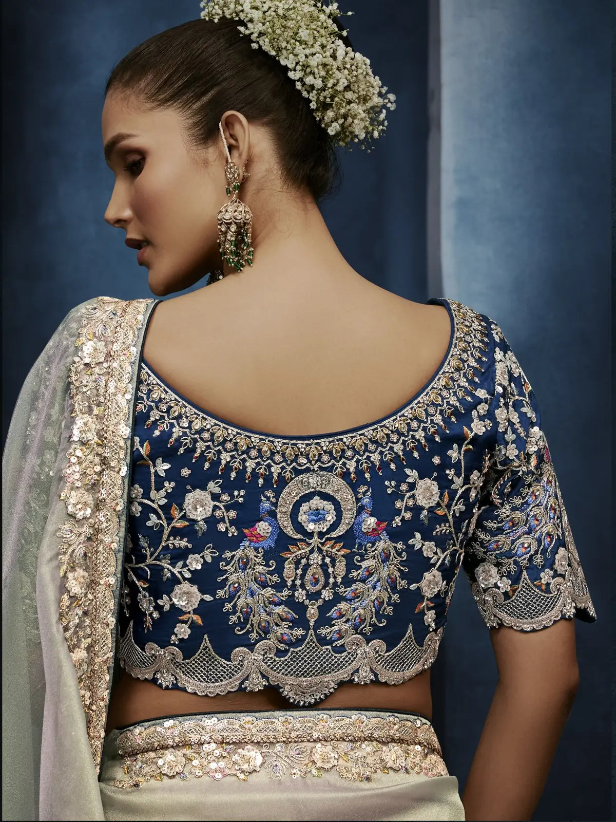 Tarani embroidered blouse back view with elegant Tarani sage green saree