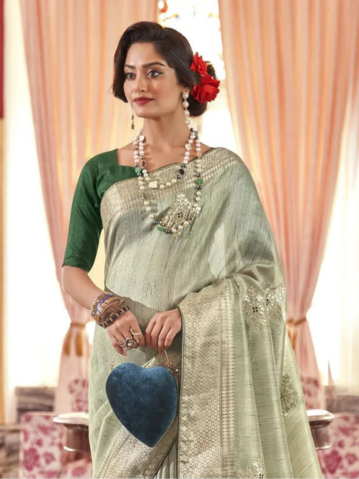 Tarani festive sage green fancy saree showing upper-body view with blouse and jewelry