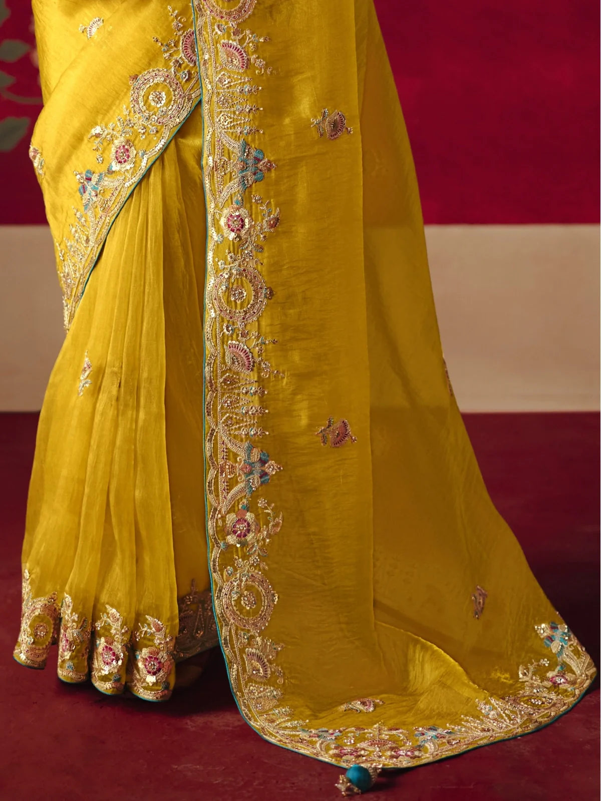Tarani yellow saree closeup of pallu detailing and border work