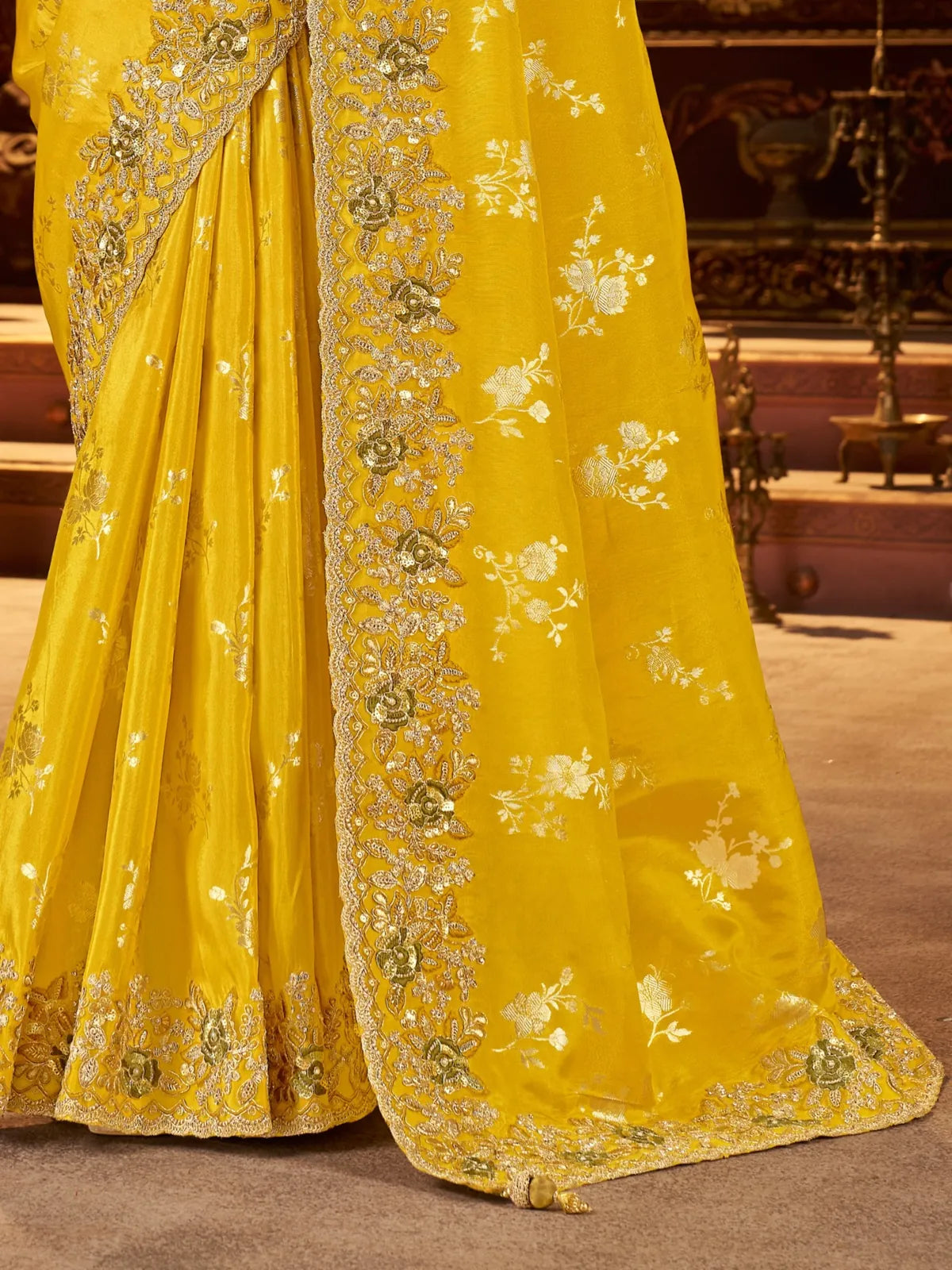 Tarani yellow saree pallu with heavy zari embroidery and designer tassel latkan