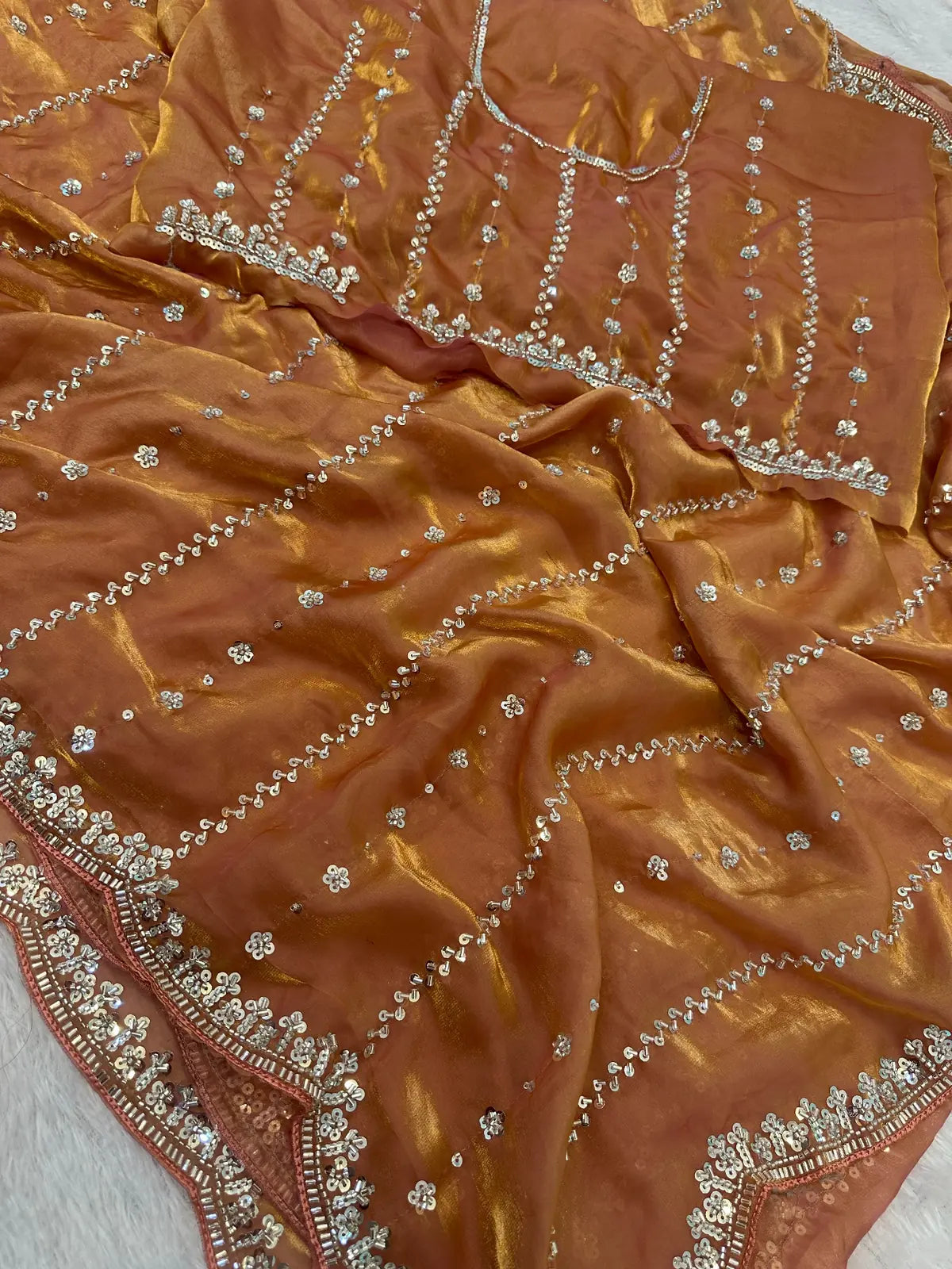 Tarani golden Fandy Satin saree closeup view of beads sequins embroidery and border work