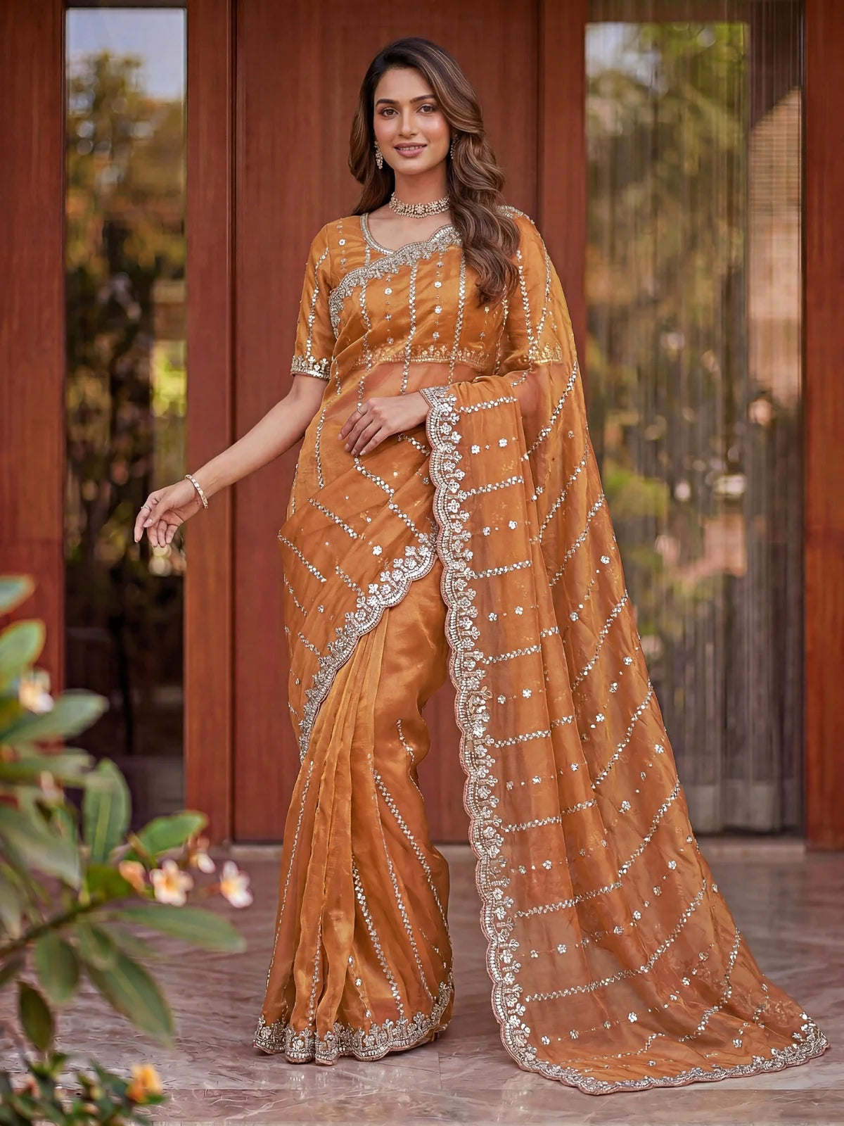 Tarani designer golden saree full length view with sequins work for wedding occasions