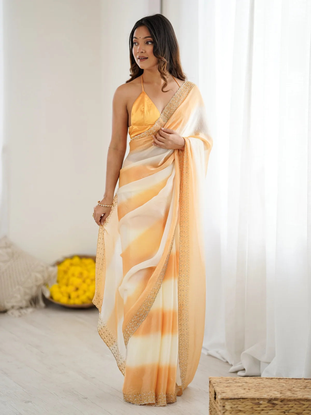 Tarani Hanshika peach and off white Fandy Satin saree with Zarkan Diamond border front view