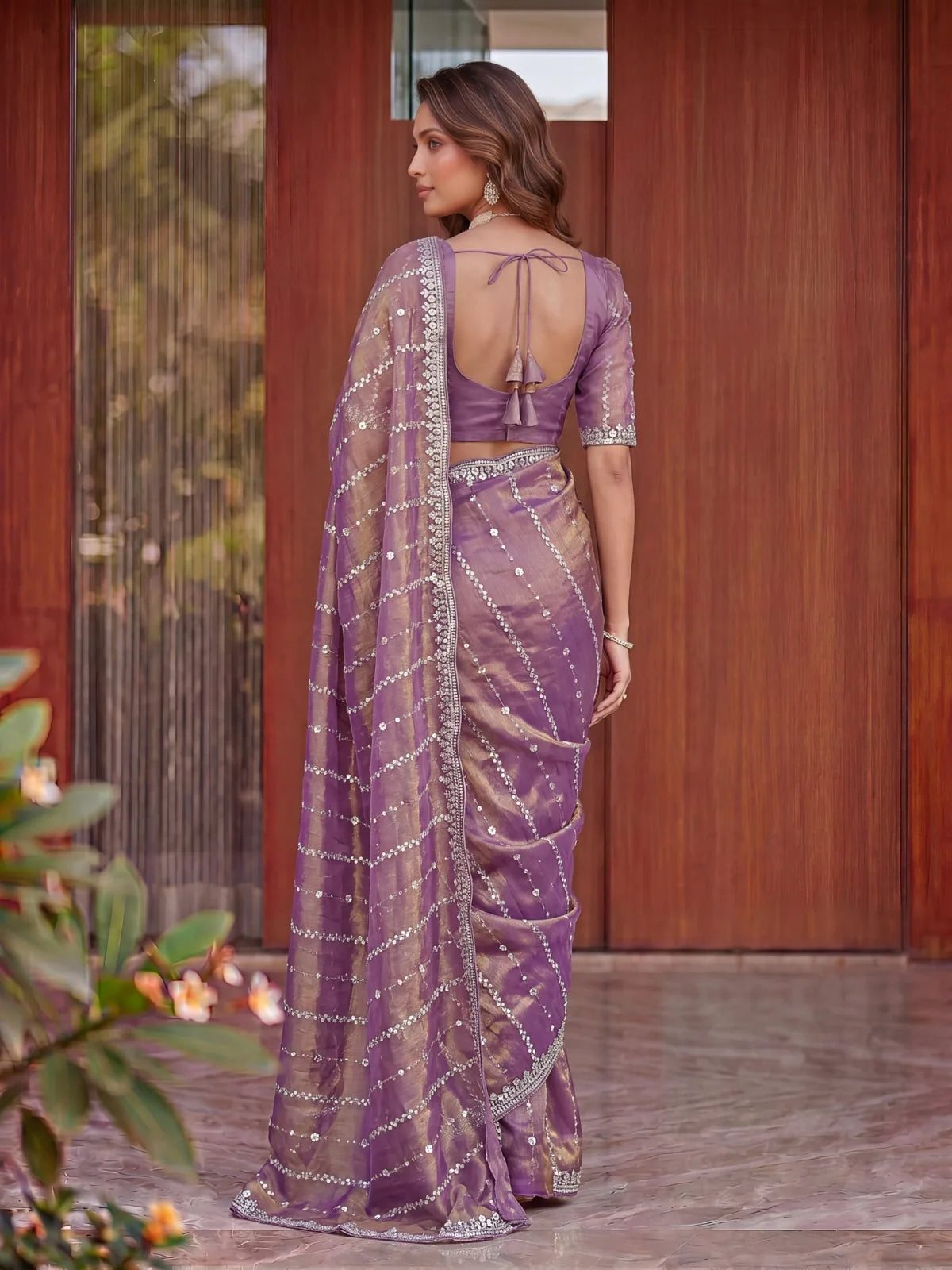 Tarani purple Fandy Satin saree back view showing blouse back design and embroidered drape