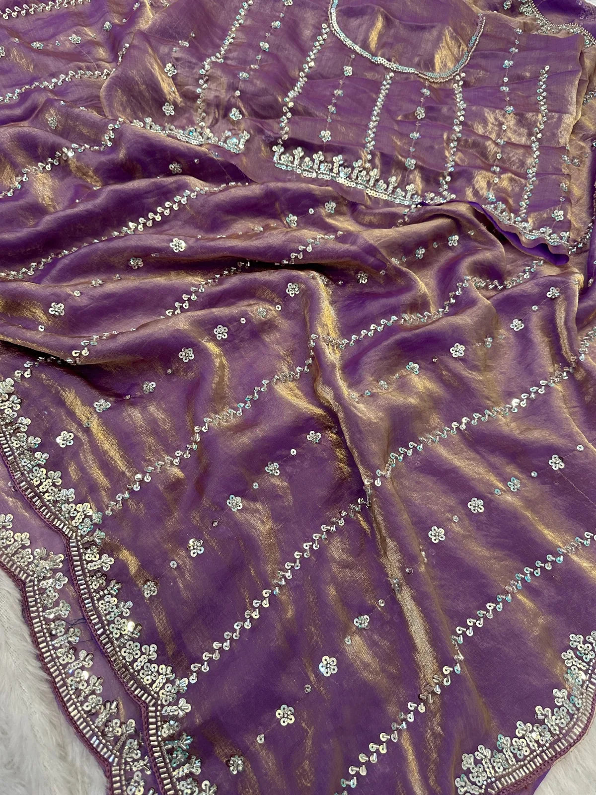 Tarani purple Fandy Satin saree closeup view of beads and sequins embroidery fabric detailing