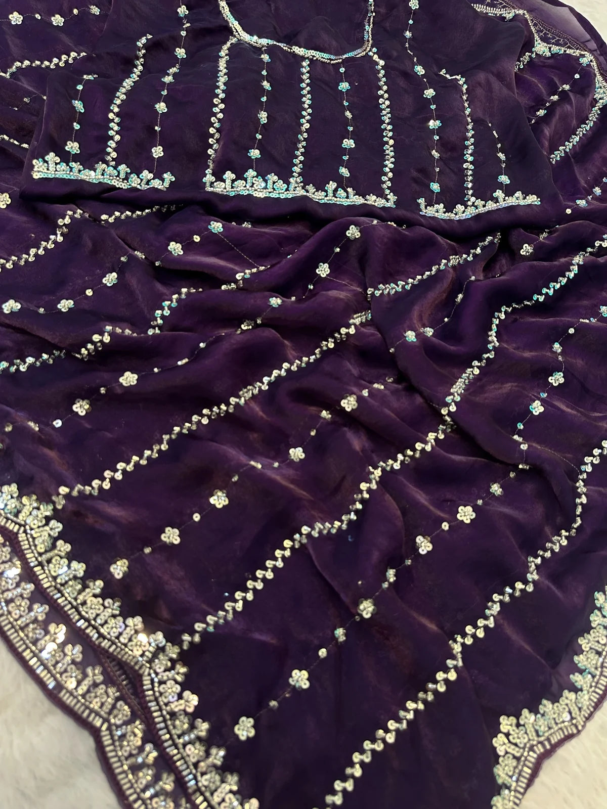 Tarani Sadhika Fandy Satin saree closeup showing beads and sequins embroidery work