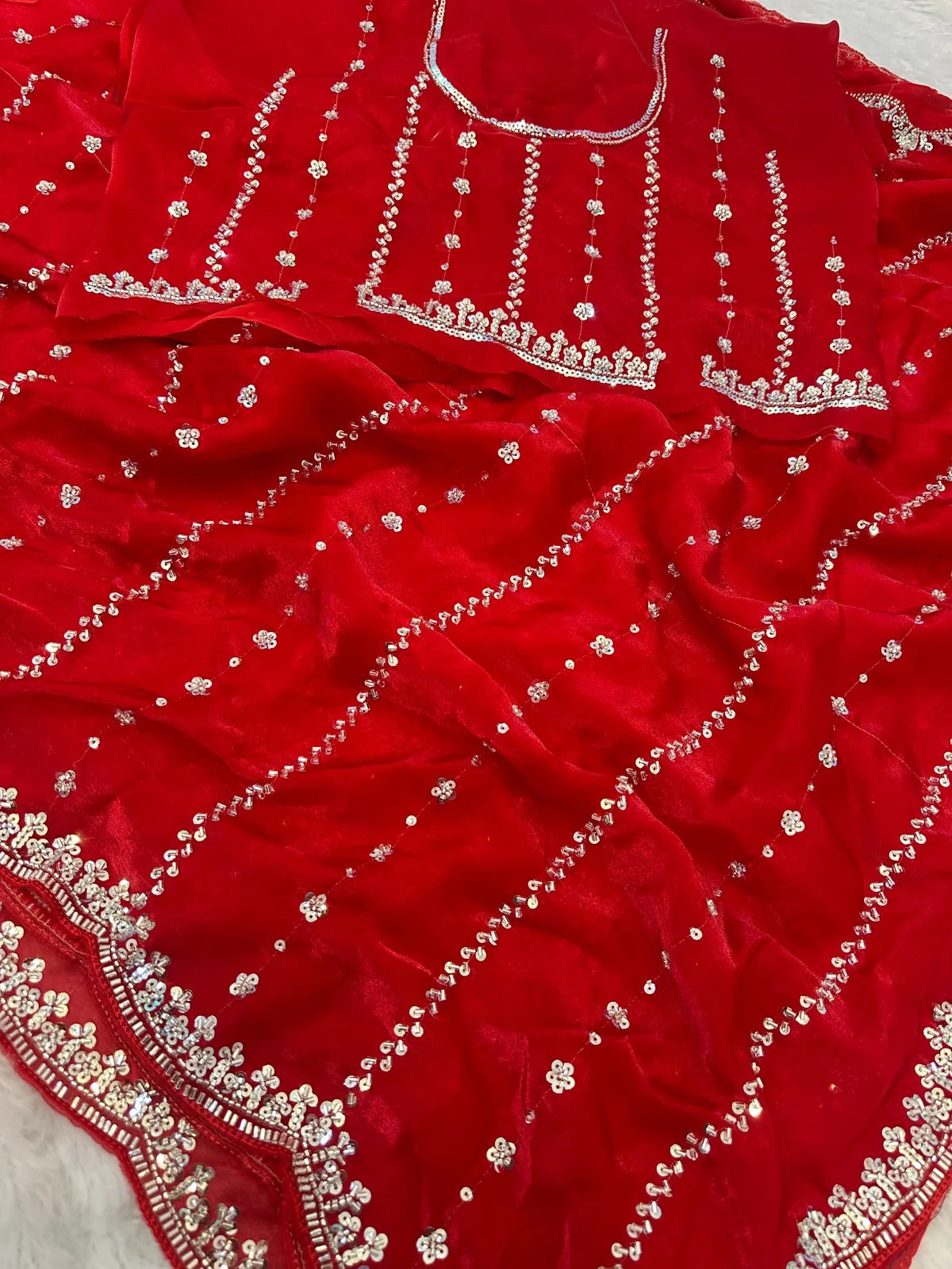 Tarani Raima red Fandy Satin saree closeup fabric view with beads and sequins embroidery work
