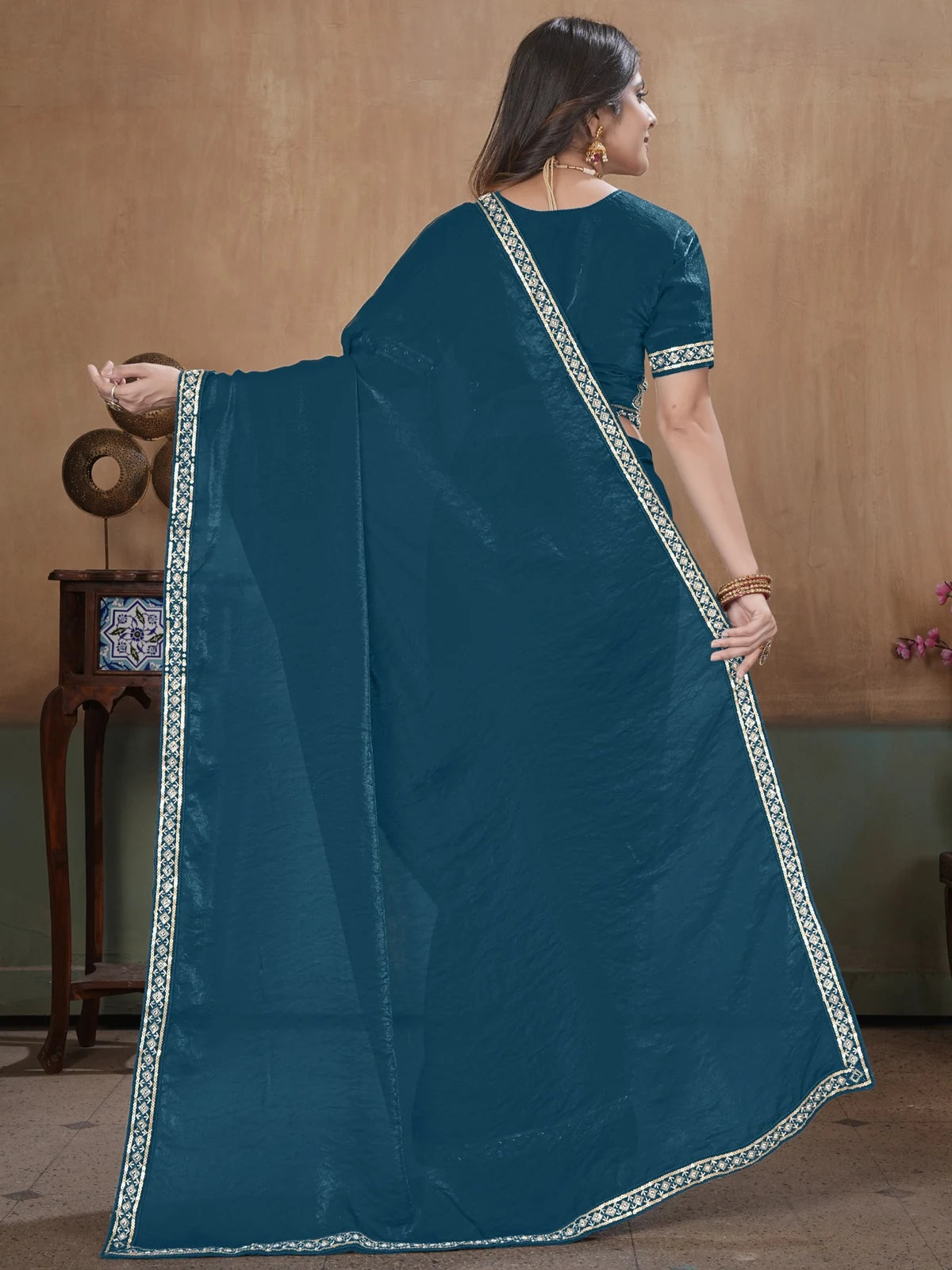 Tarani teal Fandy Satin saree back view showing pallu