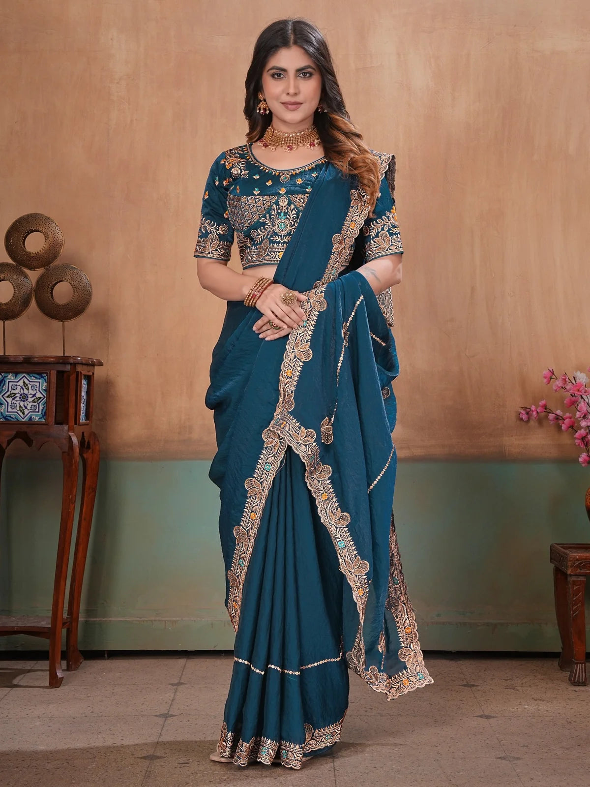 Tarani teal designer saree front drape with Swarovski embroidered border