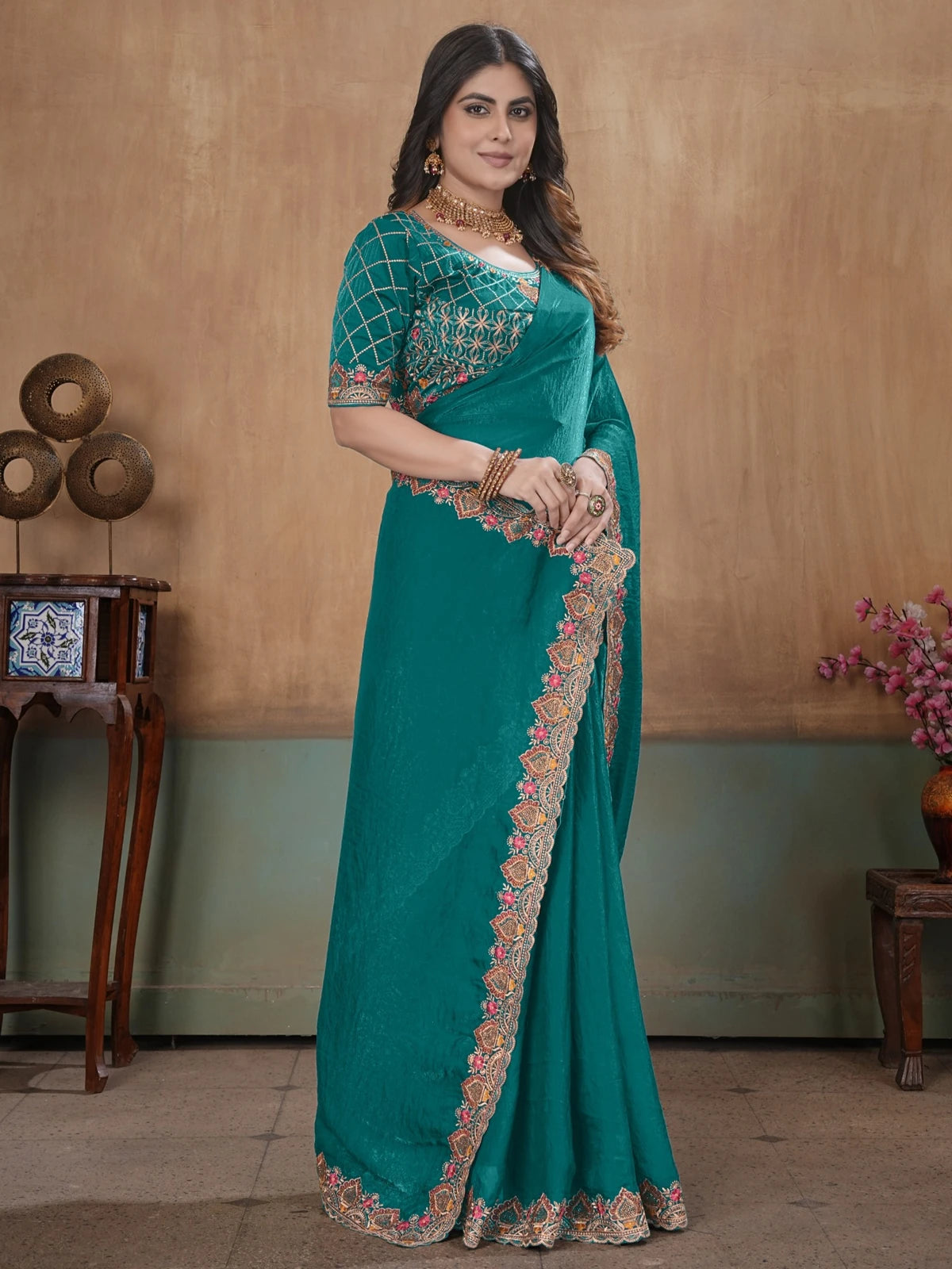 Tarani front pose showing embroidered border and readymade blouse