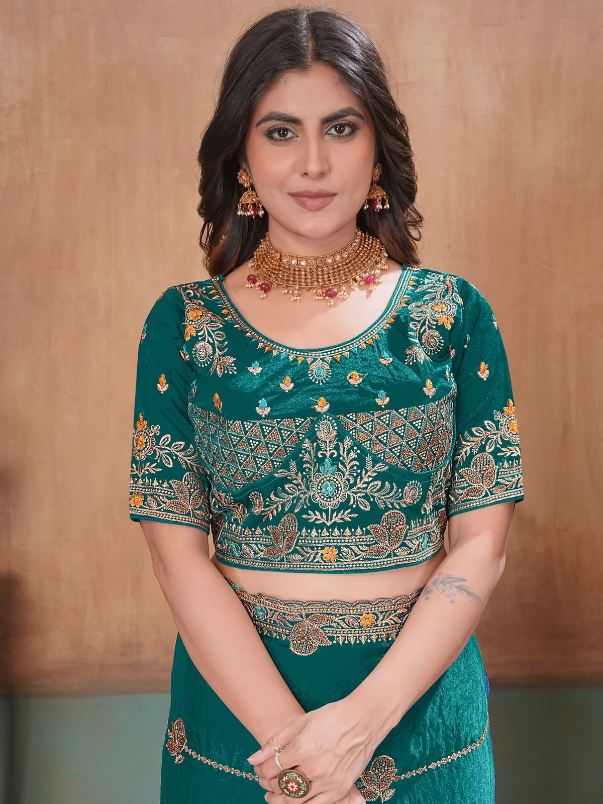 Tarani teal Fandy Satin saree upper body view highlighting embroidered readymade blouse