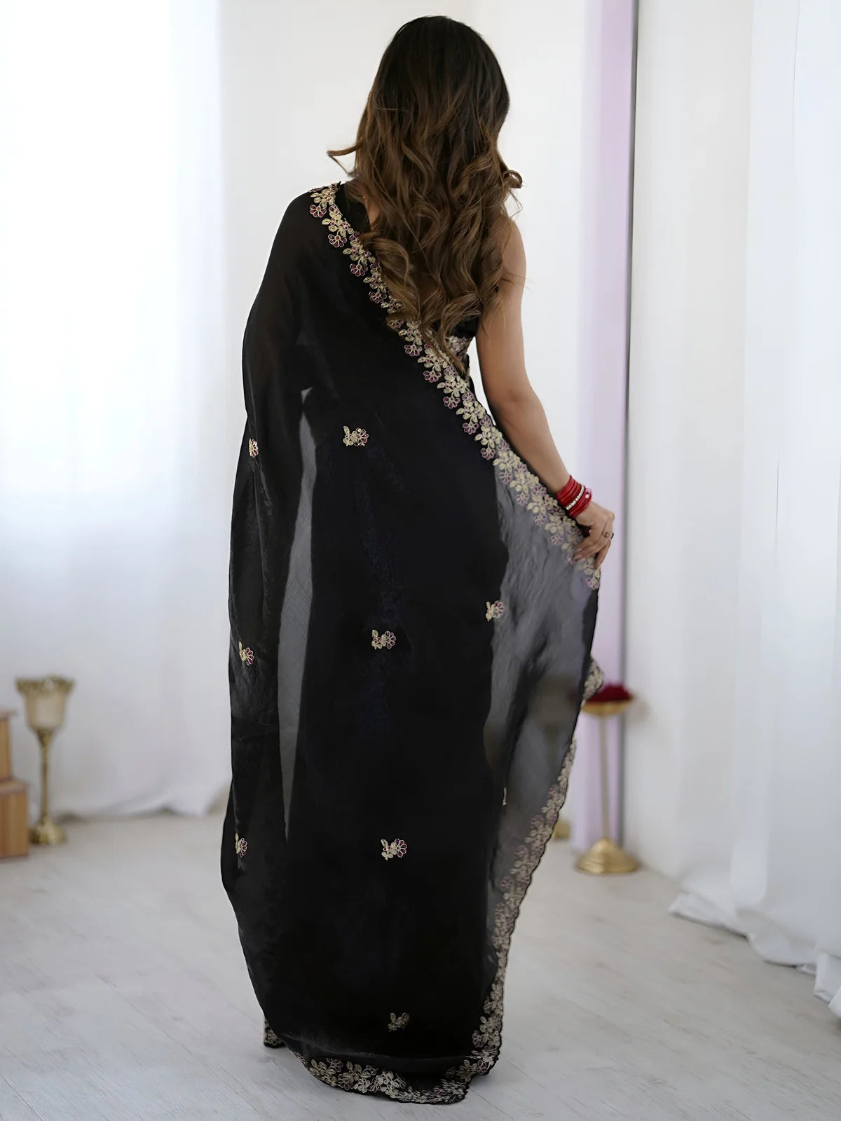 Tarani black Fandy Satin Silk saree back view with embroidered pallu and elegant detailing
