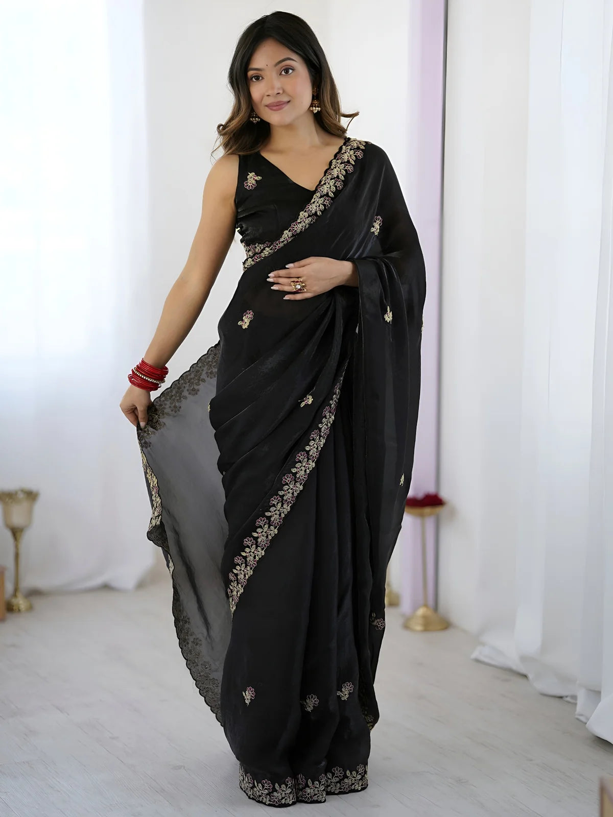 Tarani black embroidered saree front view with elegant sequin thread embroidery and graceful drape