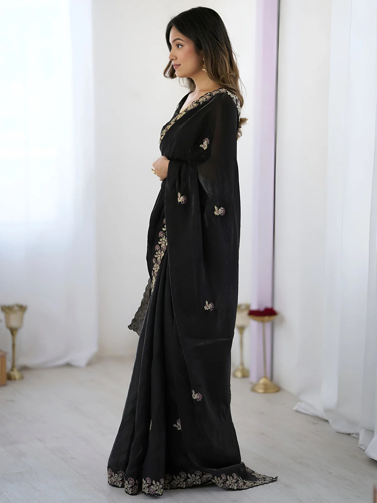 Tarani black Fandy Satin Silk saree side view with floral embroidery and cutwork border