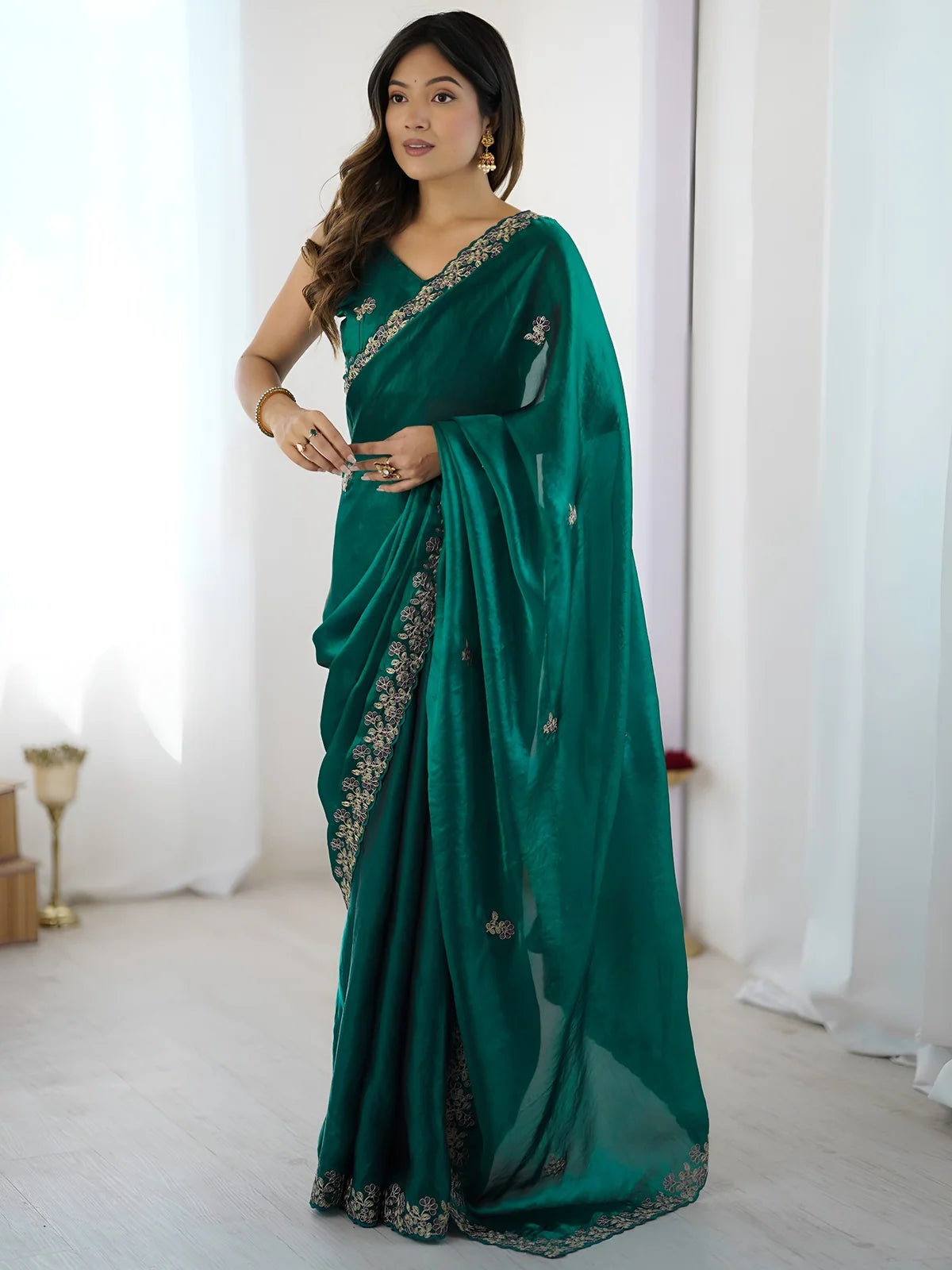 Tarani Aabha green Fandy Satin Silk saree full view with sequin embroidery and cutwork border