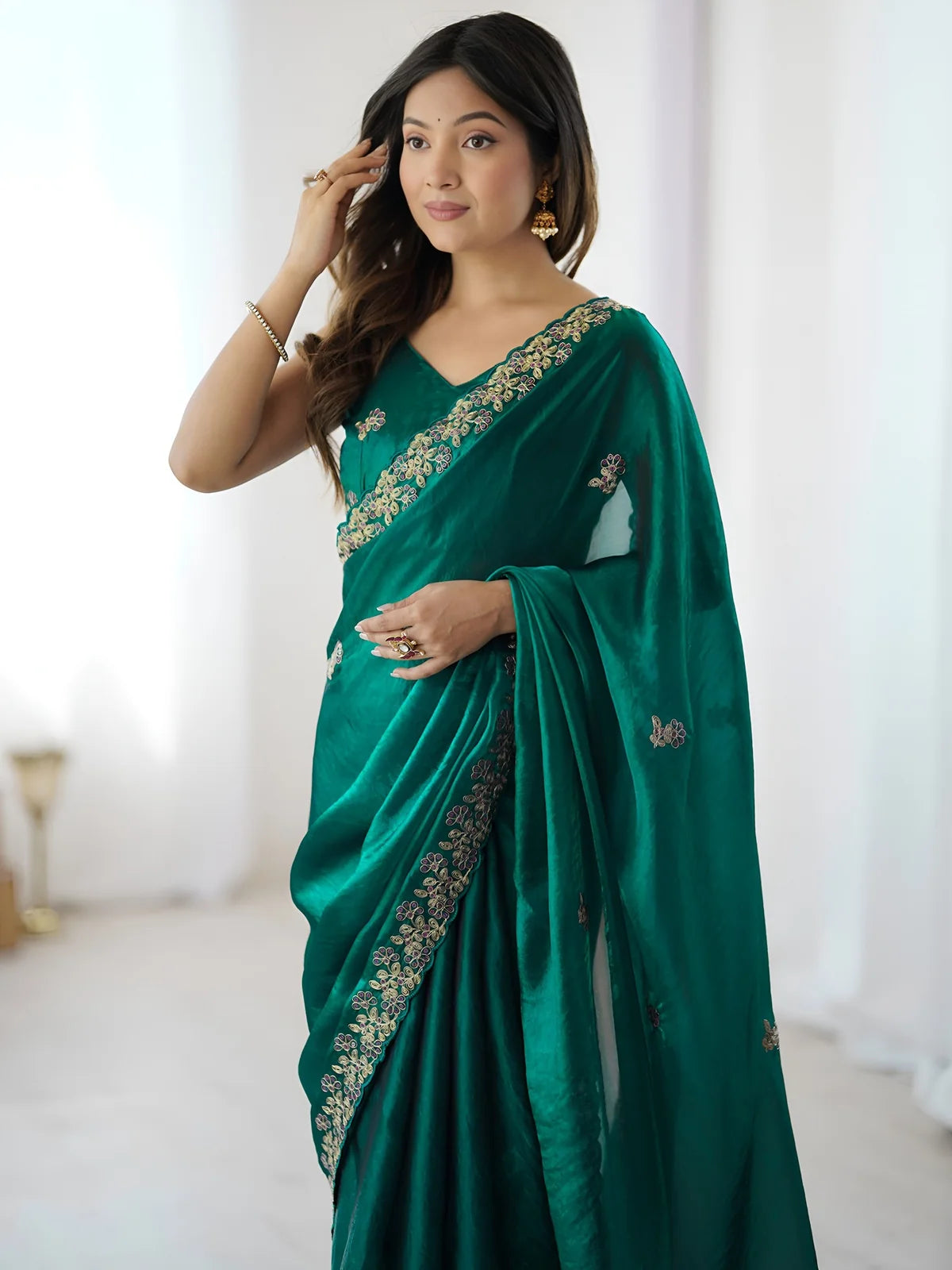 Tarani Aabha green Fandy Satin Silk saree upper body view with embroidered border detailing