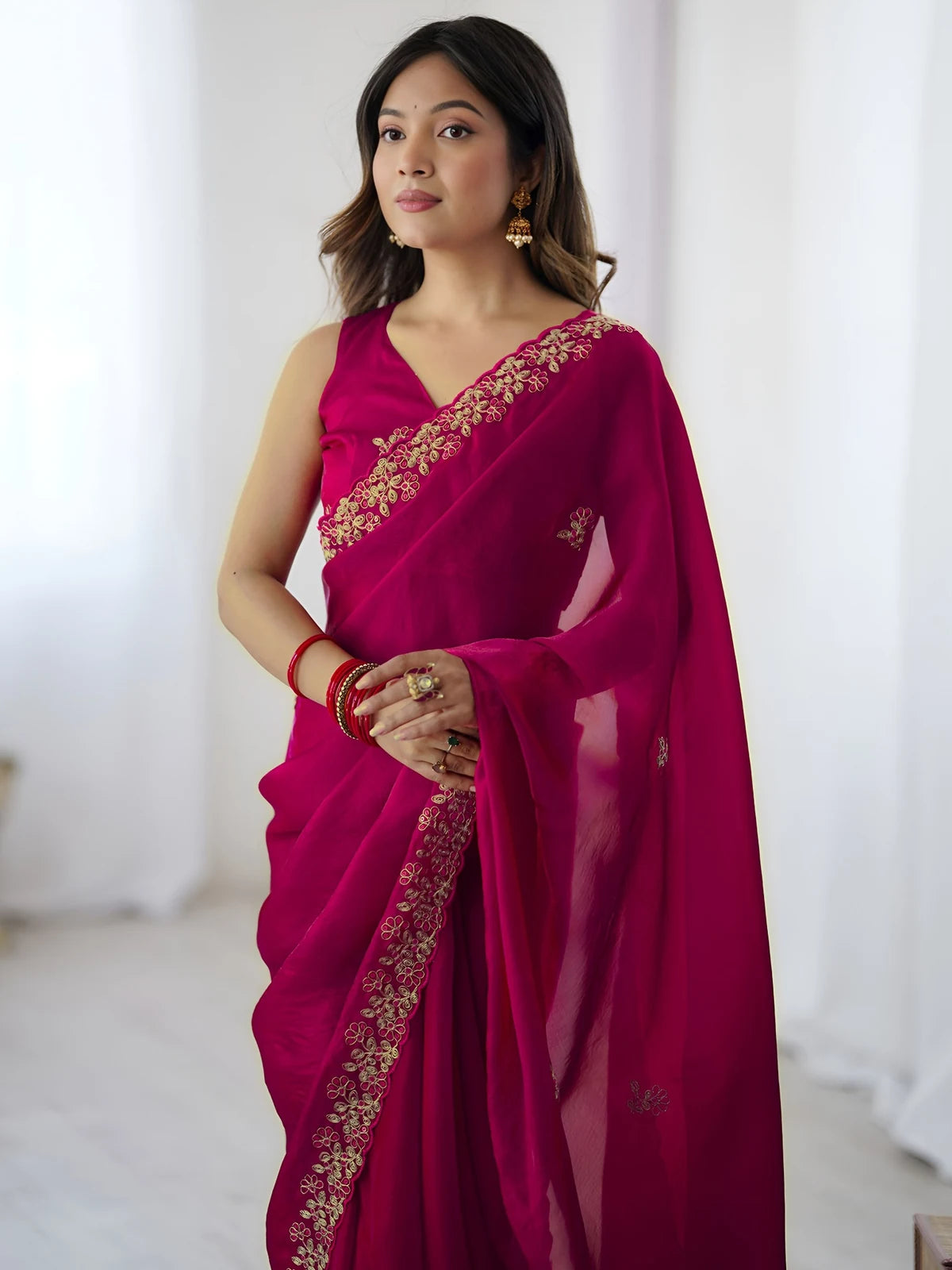 Tarani Ashmita magenta Fandy Satin Silk saree upper body view with embroidered border and designer blouse