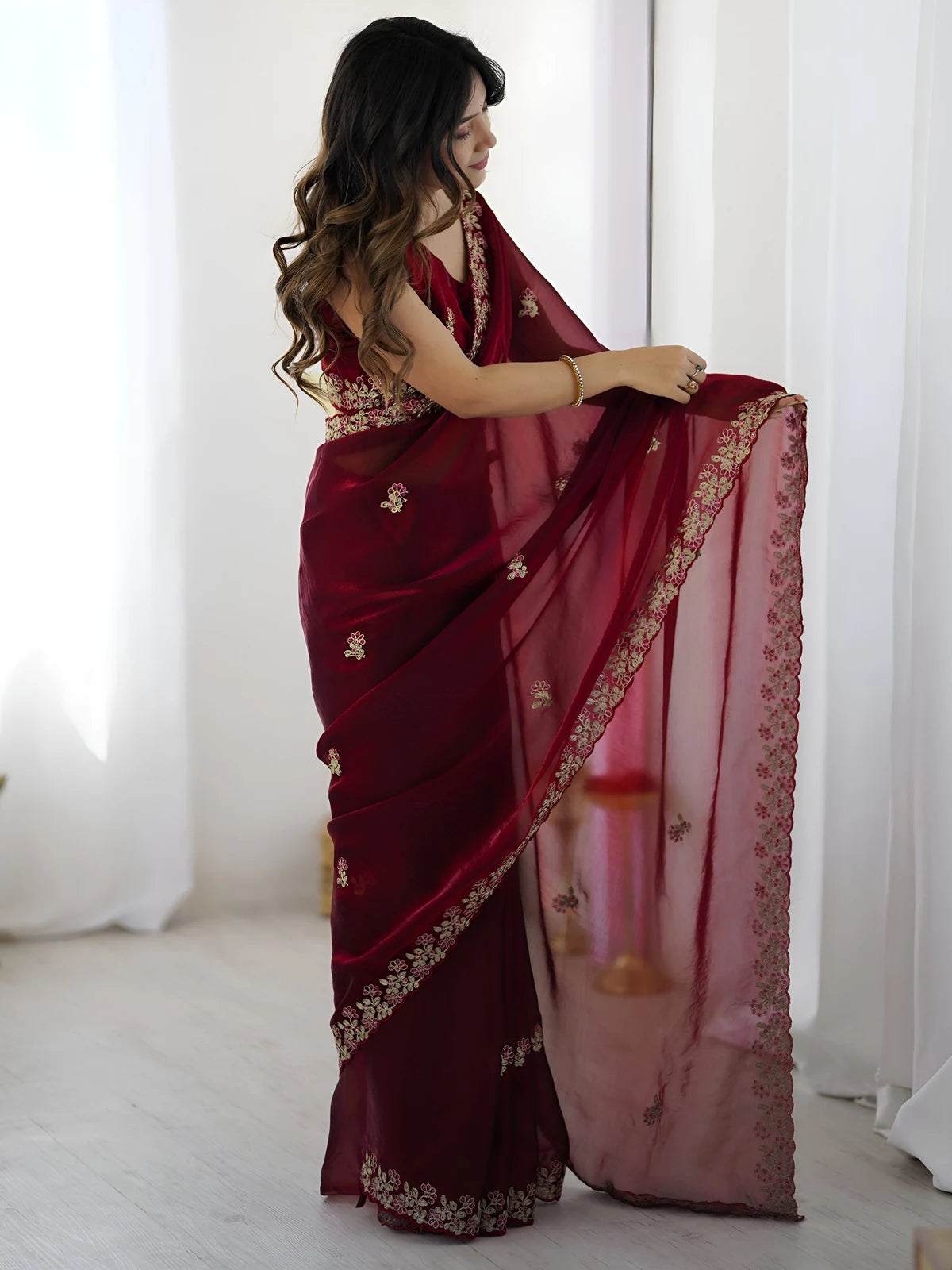Tarani maroon Fandy Satin Silk saree pallu view with sequin thread embroidery and cutwork border