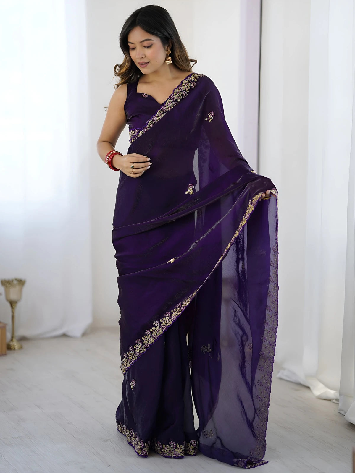 Tarani purple saree pallu view with sequins embroidery border