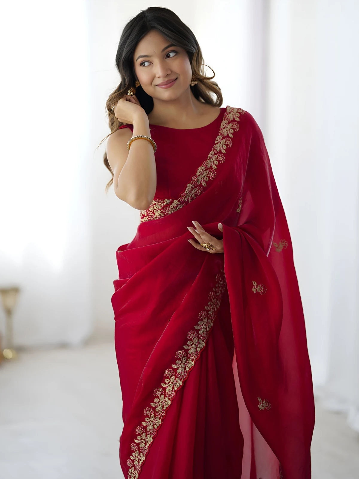 Tarani red Fandy Satin Silk saree upper body view featuring embroidered border and designer blouse