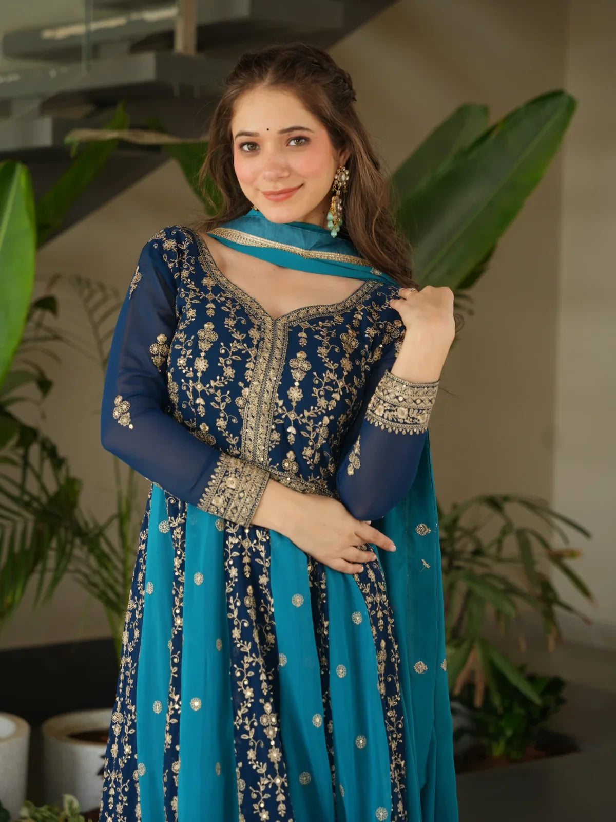Tarani designer blue faux blooming gown with dupatta upper body embroidery view