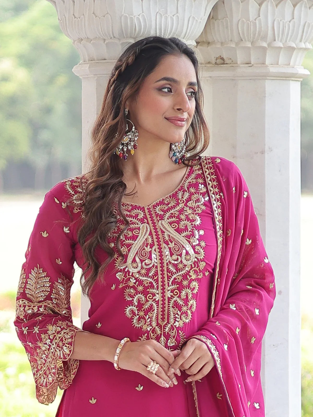 Tarani designer pink faux blooming festive dress with embroidered neck detail