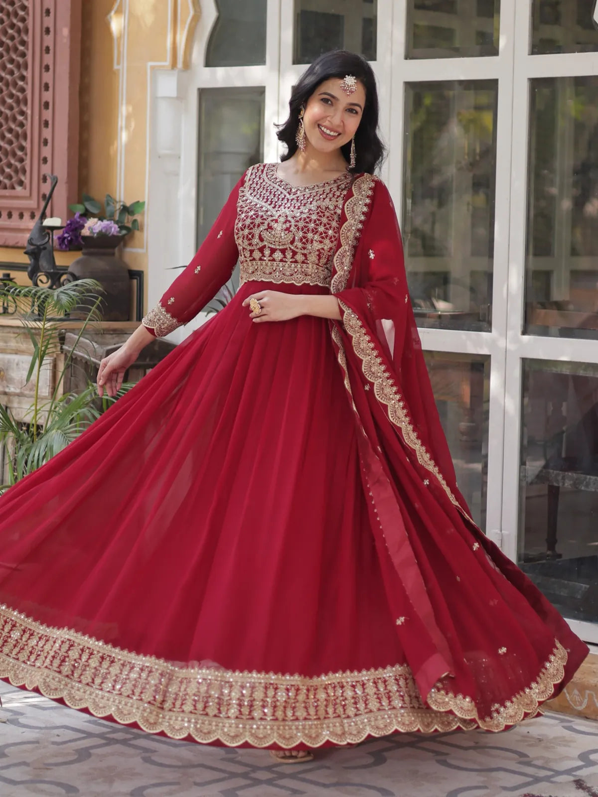 Tarani festive maroon gown front view with zari and sequin embroidery detailing